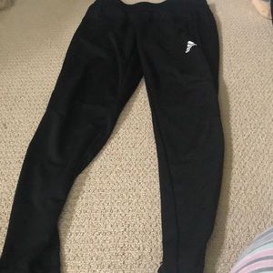 Adidas running pants with tapered zip leg